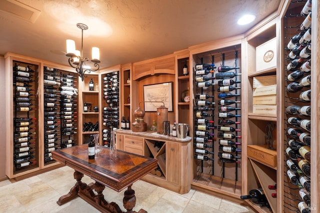 wine area with an inviting chandelier