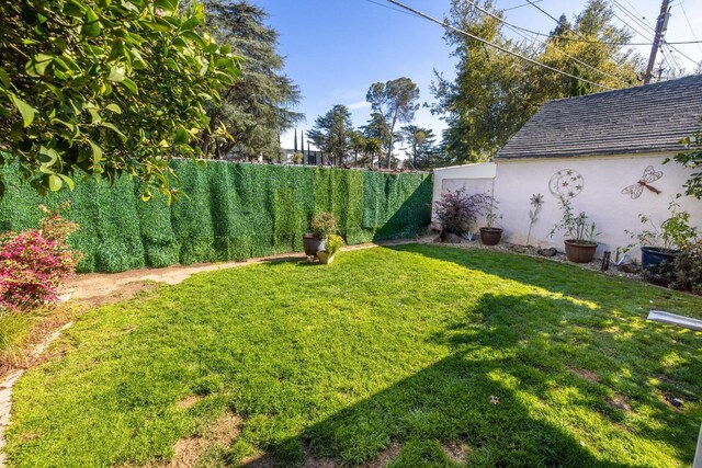 view of yard with fence