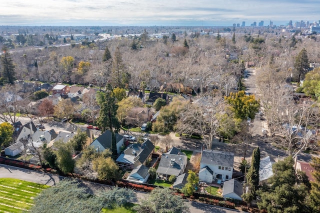 birds eye view of property with a residential view