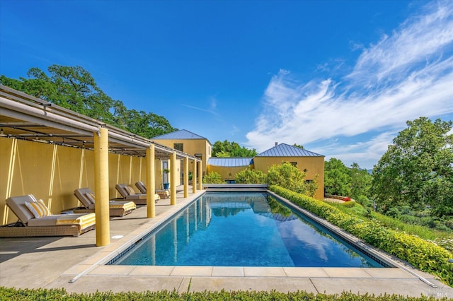 pool with a patio