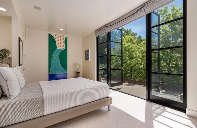 bedroom with recessed lighting and carpet floors