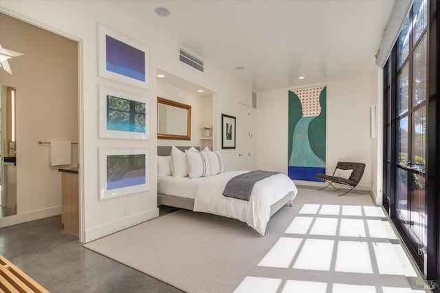 bedroom featuring multiple windows, baseboards, visible vents, and concrete floors