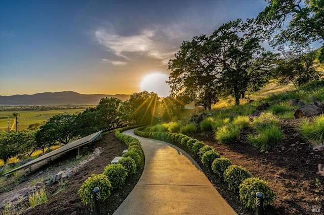 surrounding community with a mountain view