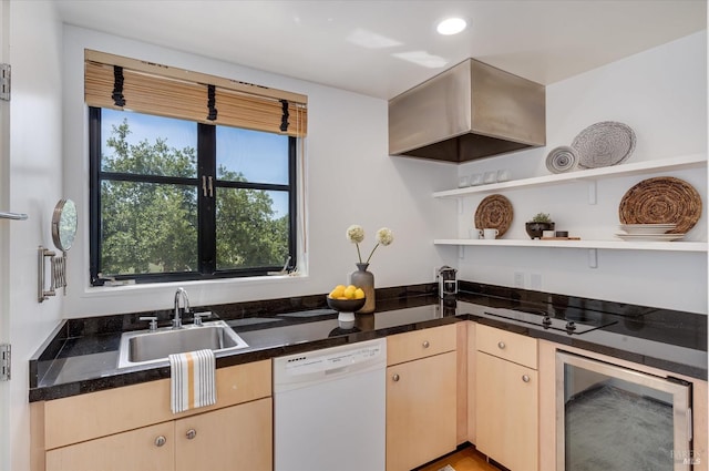 kitchen with open shelves, light brown cabinets, beverage cooler, white dishwasher, and a sink