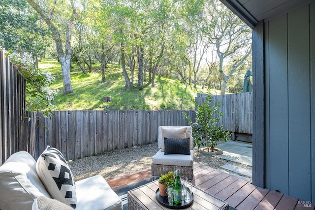 deck featuring a fenced backyard