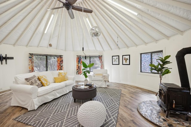 224 Arroyo Rd, Forest Knolls, CA 94933 - living room featuring a wood stove, a wealth of natural light, high vaulted ceiling, and wood finished floors