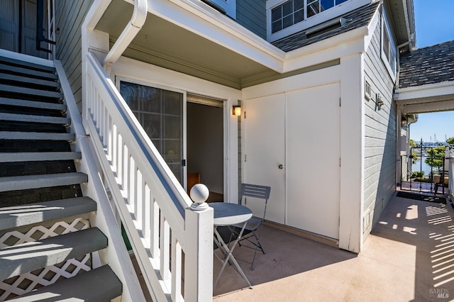 entrance to property featuring a patio