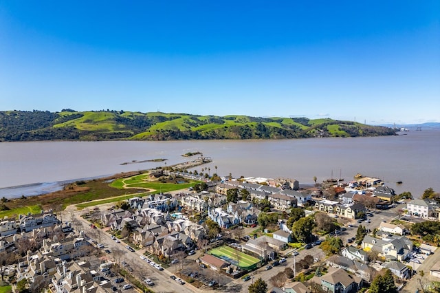 bird's eye view with a residential view and a water view