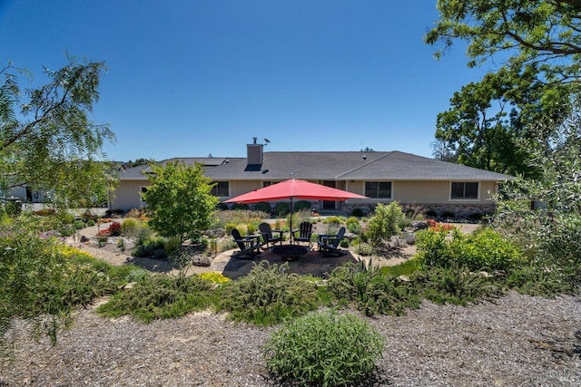 4630 Maddocks Rd, Sebastopol, CA 95472 - rear view of house with stone siding and a patio area