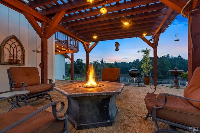 4630 Maddocks Rd, Sebastopol, CA 95472 - patio terrace at dusk featuring an outdoor fire pit, a pergola, a patio area, and grilling area