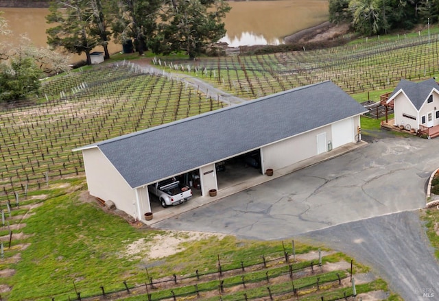 birds eye view of property featuring a rural view