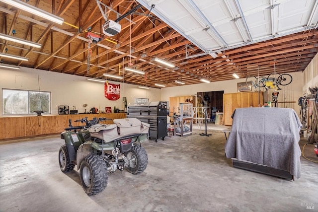 garage featuring a garage door opener