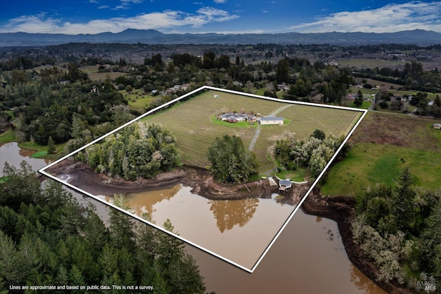 4630 Maddocks Rd, Sebastopol, CA 95472 - aerial view of property and surrounding area featuring property parcel outlined, rural landscape, and a water and mountain view
