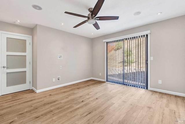 unfurnished room with recessed lighting, baseboards, and light wood-style flooring