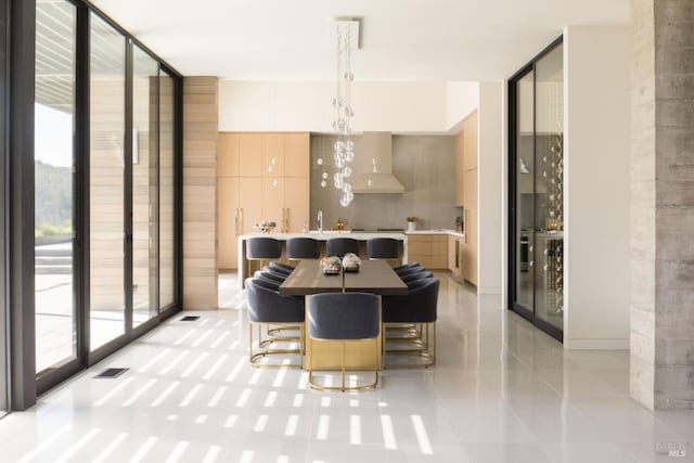 dining area with expansive windows and visible vents