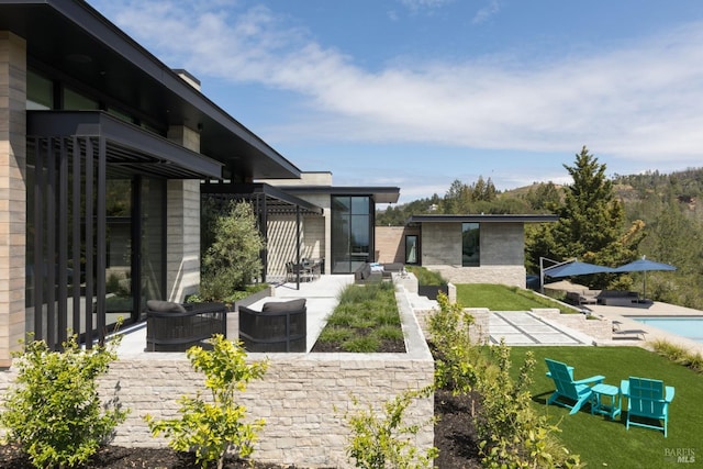 exterior space with a yard and a patio area