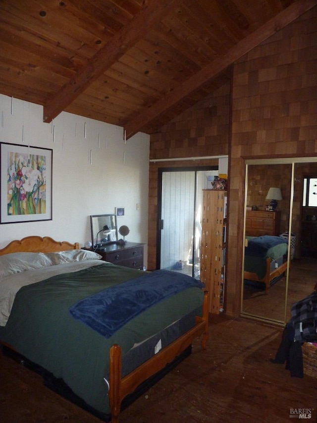 bedroom featuring vaulted ceiling with beams, wood ceiling, and wood finished floors