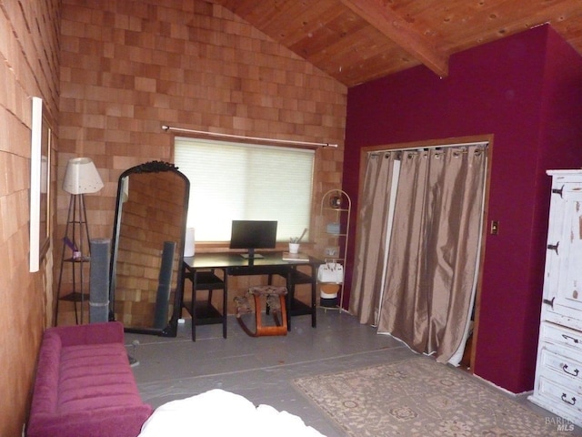 home office with vaulted ceiling with beams and wooden ceiling