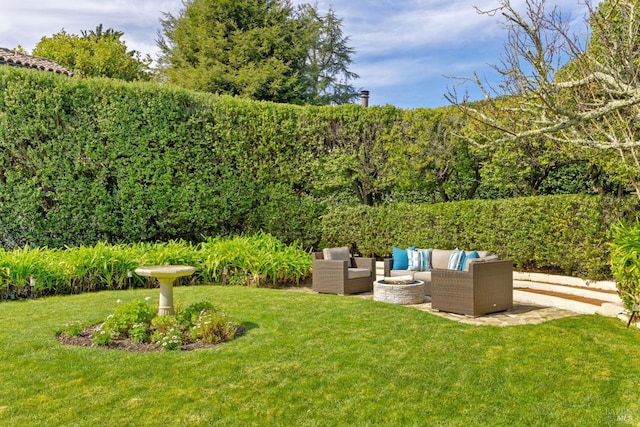 view of yard with outdoor lounge area, a patio, and fence