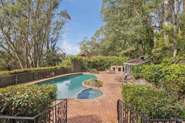 view of swimming pool with a fenced in pool, a patio area, and fence