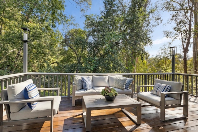 wooden deck featuring an outdoor hangout area