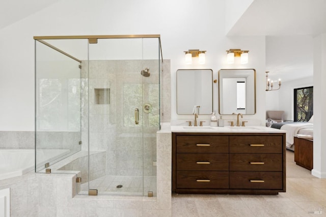 ensuite bathroom featuring a stall shower, a sink, ensuite bathroom, and a bath