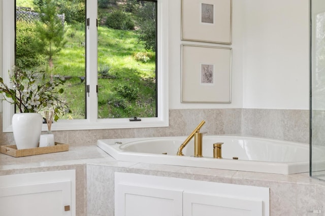 full bathroom featuring a garden tub