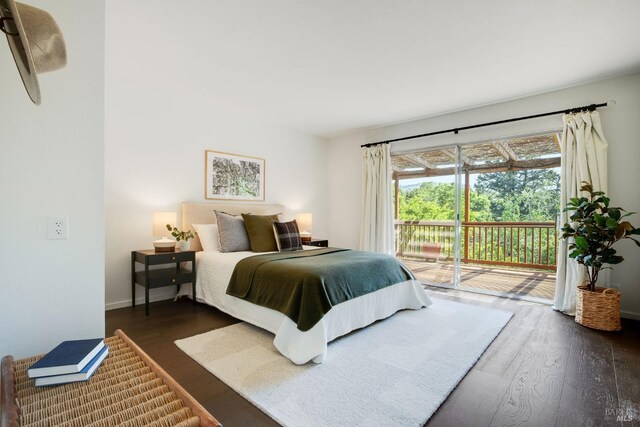 5 Madrone Ave, Woodacre, CA 94973 - bedroom with wood finished floors, access to exterior, and baseboards