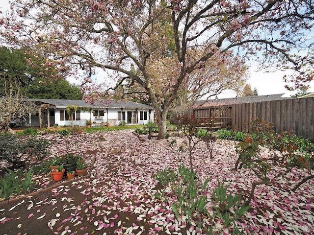 view of yard with fence