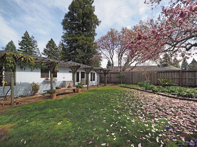 view of yard with fence