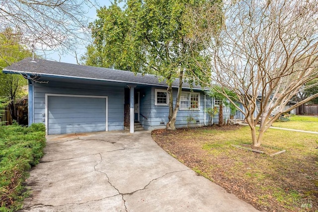 single story home featuring roof with shingles, concrete driveway, an attached garage, a front yard, and crawl space