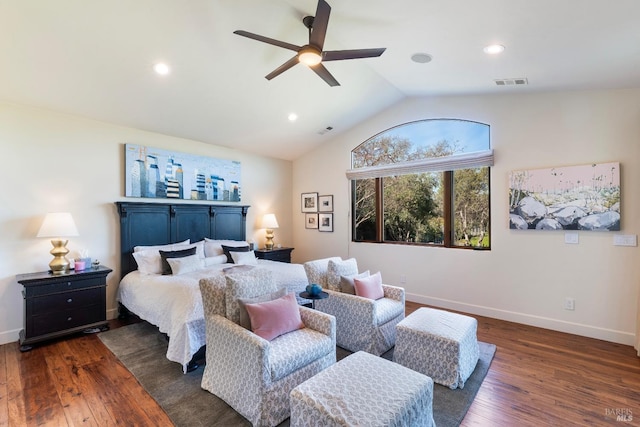 bedroom featuring baseboards, visible vents, vaulted ceiling, and dark wood finished floors