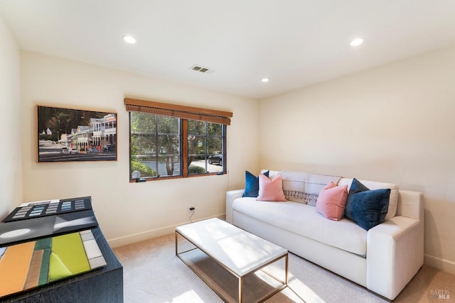 living area featuring recessed lighting, carpet flooring, visible vents, and baseboards