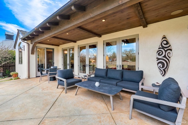 view of patio / terrace with an outdoor hangout area and french doors