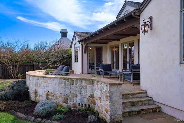 view of patio / terrace featuring fence