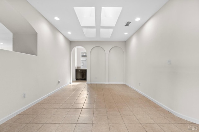 spare room featuring recessed lighting, visible vents, baseboards, and light tile patterned floors