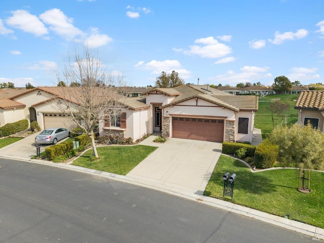 view of front of home with stucco siding, a front yard, a garage, stone siding, and driveway
