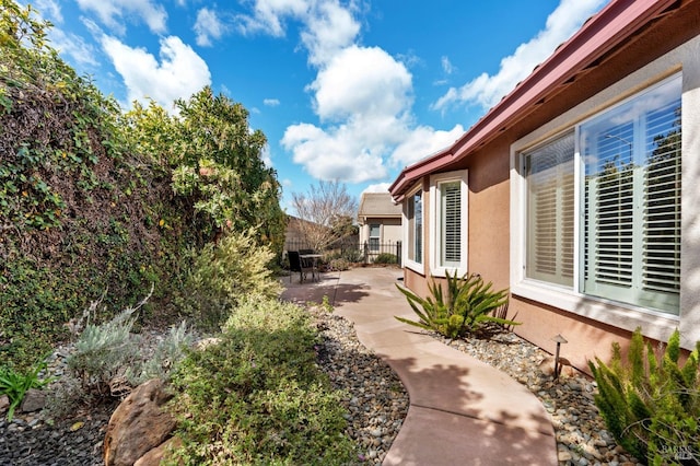 view of yard featuring a patio area and fence