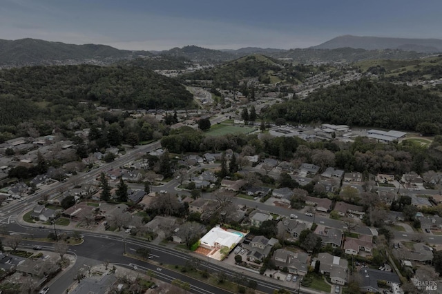 birds eye view of property with a residential view and a mountain view