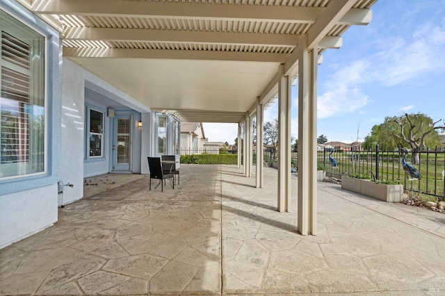 view of patio with fence