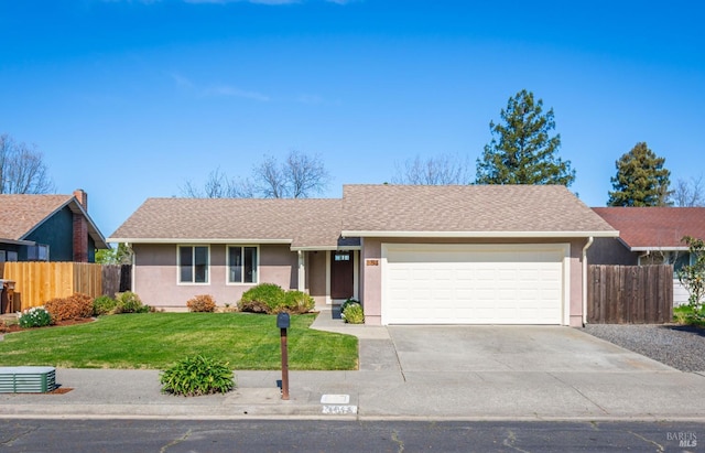 ranch-style house featuring concrete driveway, a front lawn, fence, and stucco siding