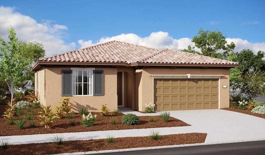 view of front of property with driveway, a tiled roof, a garage, and stucco siding