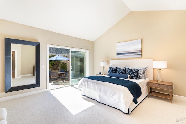 carpeted bedroom with access to outside, lofted ceiling, and baseboards