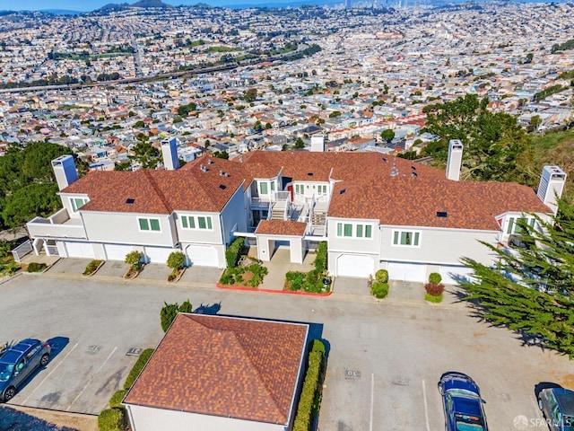 bird's eye view with a residential view and a mountain view