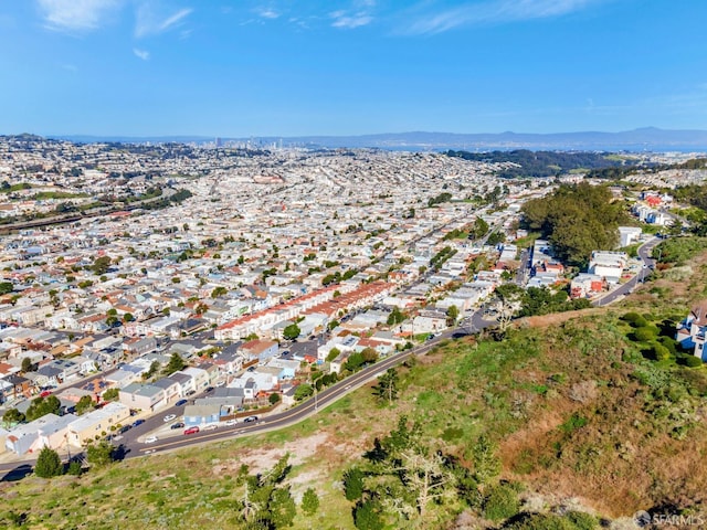birds eye view of property featuring a residential view and a mountain view