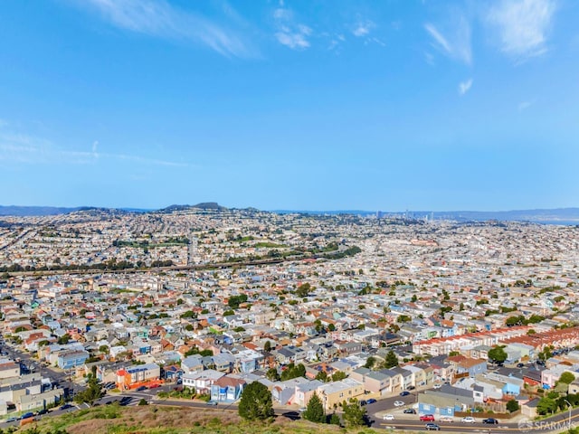 aerial view featuring a residential view and a mountain view