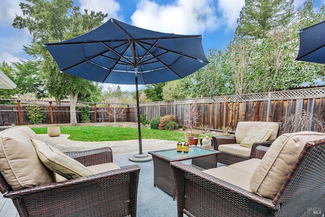 view of patio featuring a fenced backyard and an outdoor hangout area