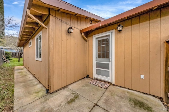 doorway to property featuring a patio