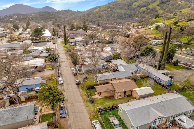 bird's eye view with a residential view and a mountain view