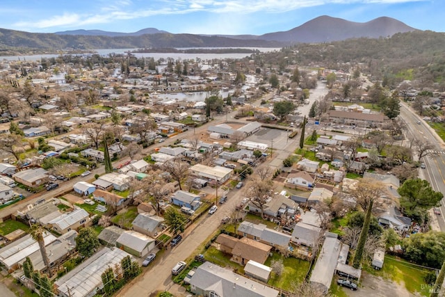 bird's eye view featuring a residential view and a mountain view